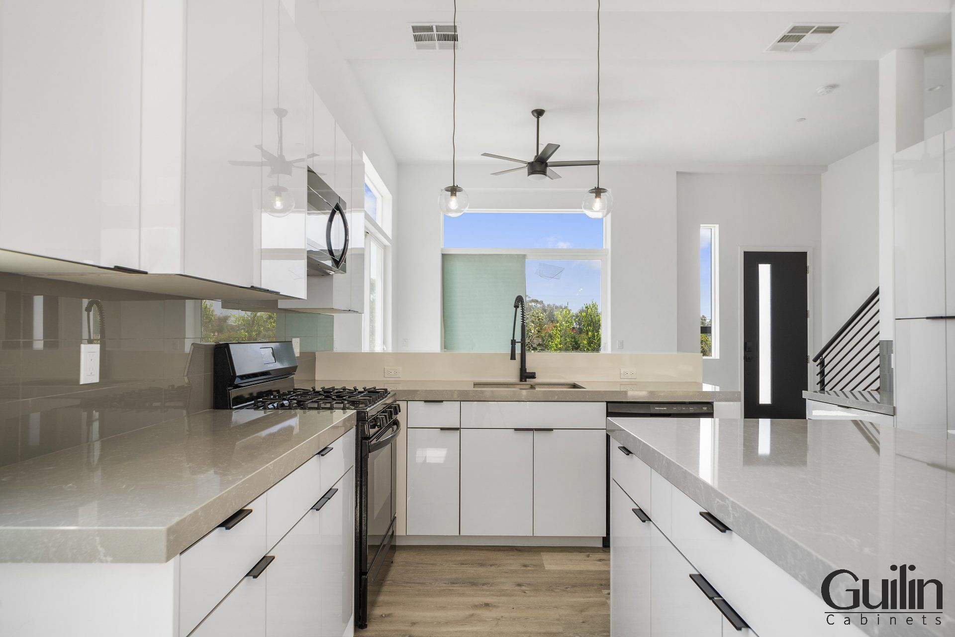 White cabinets are great because they accurately reflect all other colors in the color spectrum, making them perfect for any kitchen design.