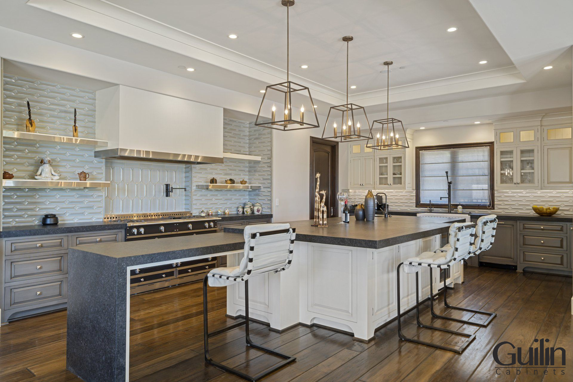 Open shelving can provide the illusion of extra space and light in your kitchen by lowering the height of the typical upper cabinets.