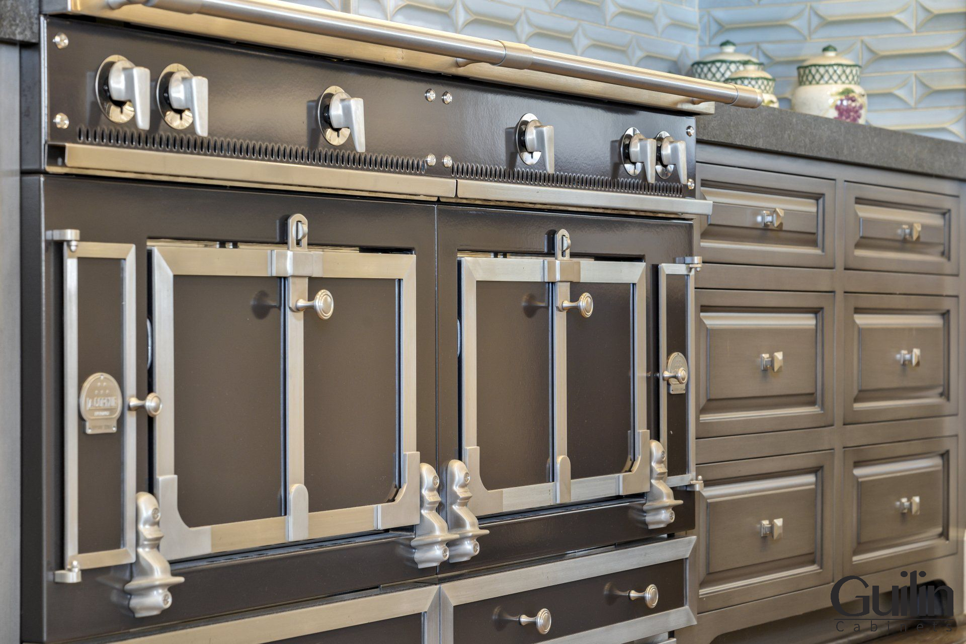 Blue Kitchen Cabinets with Sleek Brass Hardware - Transitional