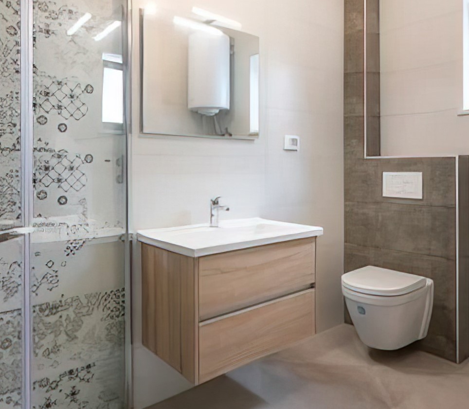 To make a small bathroom look bigger, optimizing the space under the sink is an essential factor to consider.