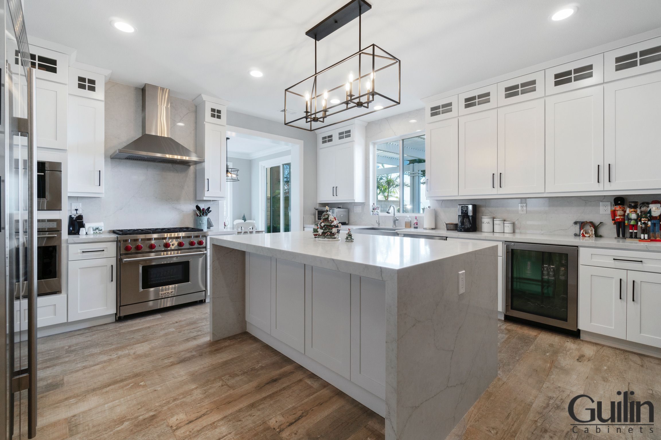 Grey kitchen cabinets, paired with off-white walls and light grey or white countertops, is a popular combination that trending and many homeowners love.