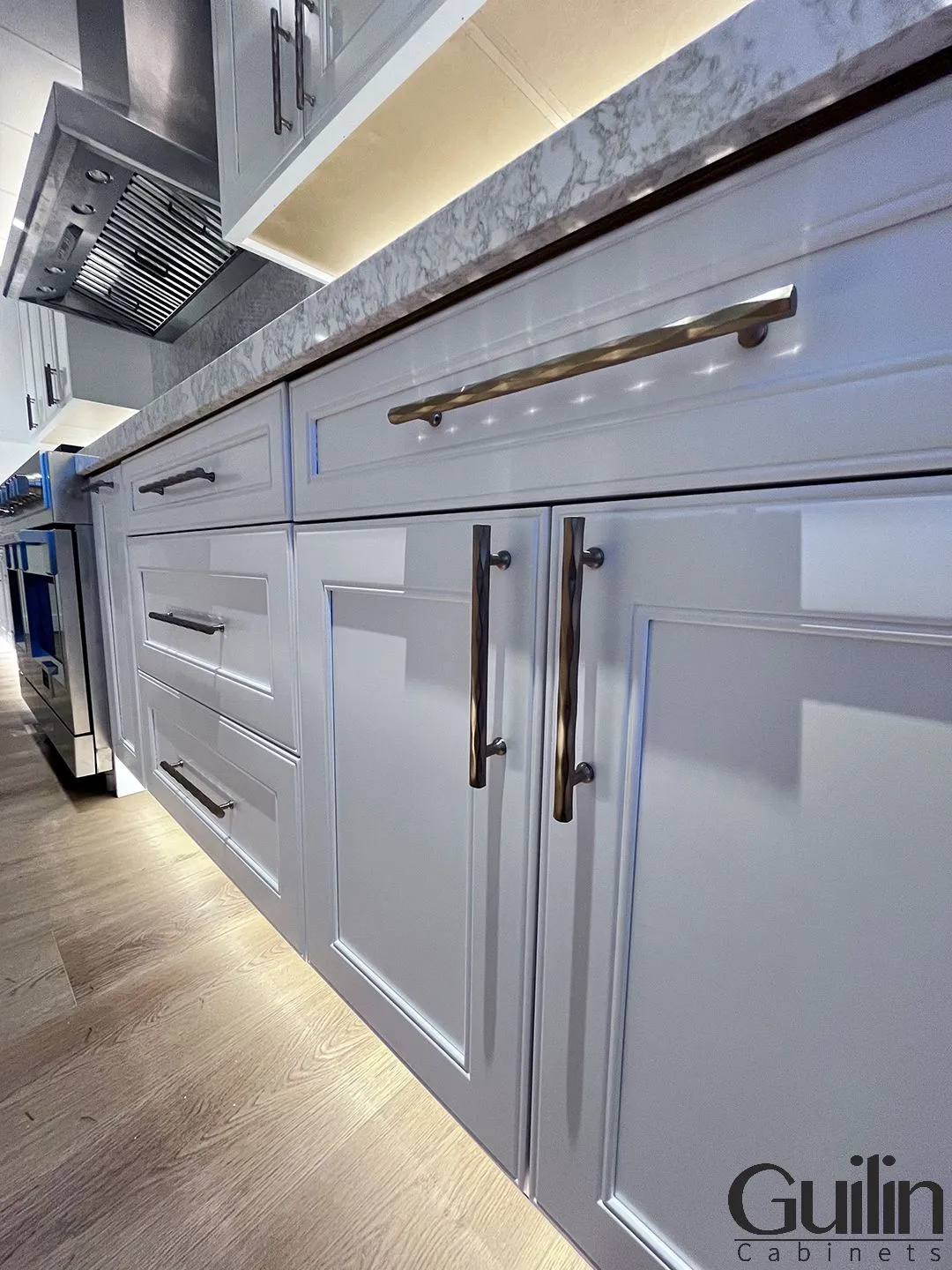 Silver hardware is a versatile and classic choice that complements the crispness of white cabinets. It offers a clean and modern aesthetic.