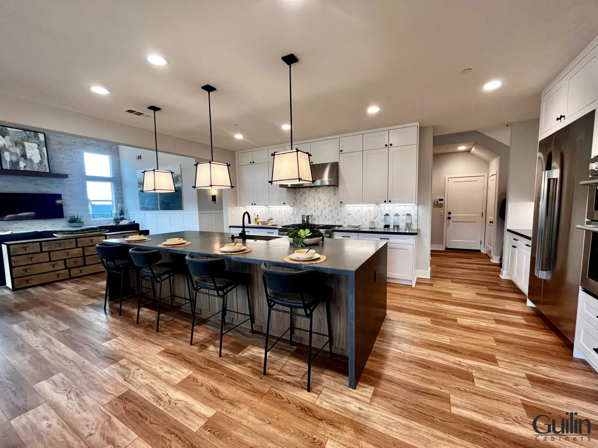 One wall kitchen layout with island Design by Guilin Cabinets