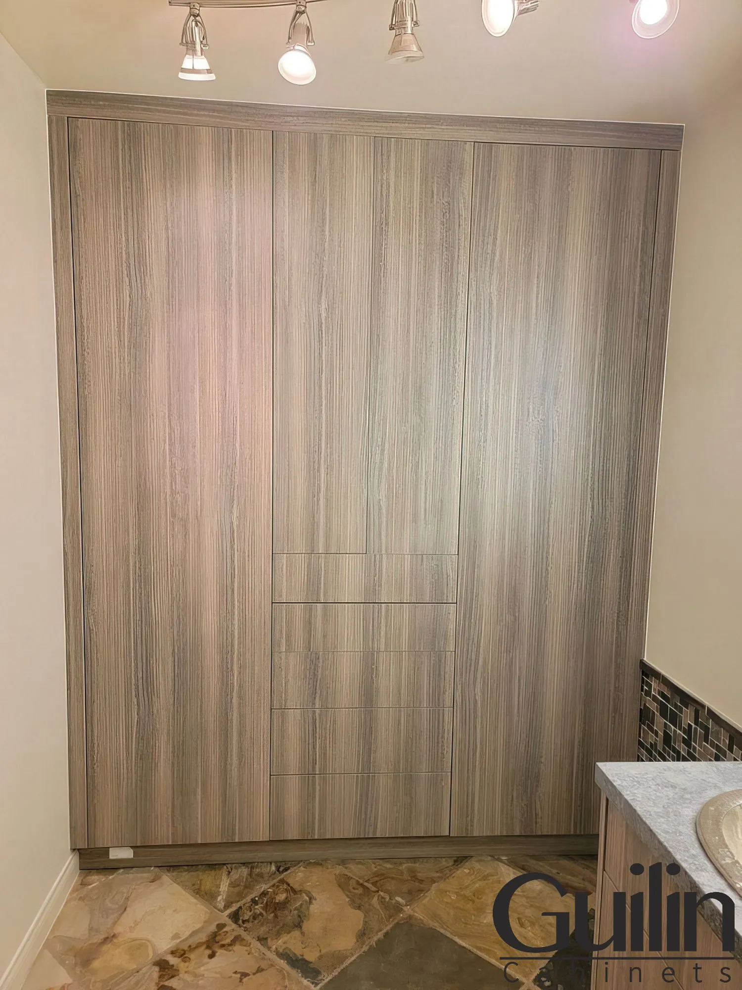 Custom Refacing the bathroom cabinets with wood veneers - Custom Closet, Cabinet in Bathroom with Sleek, Vanity Look Santa Ana, CA - Guilin Cabinets