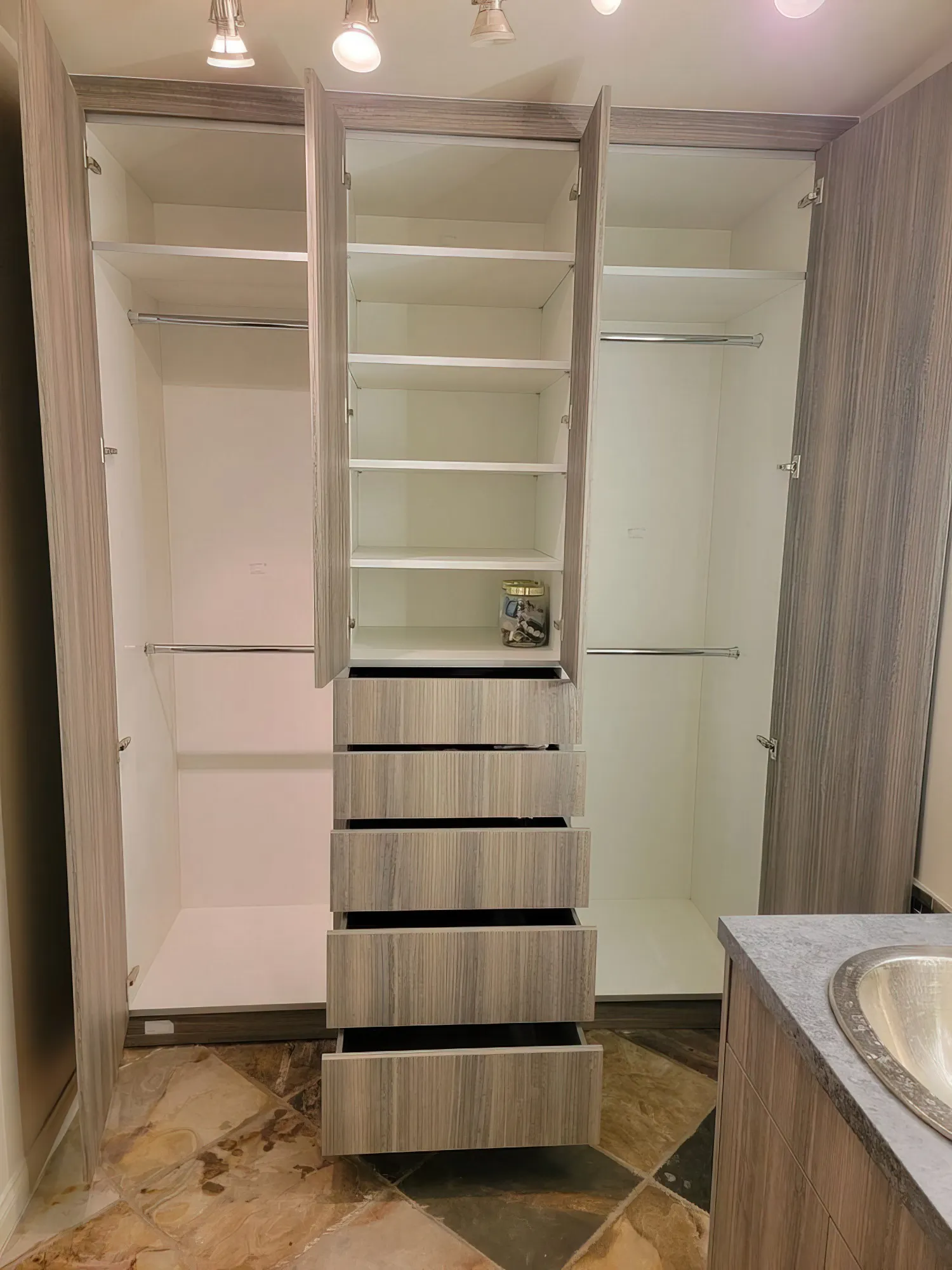 Custom Closet, Cabinet in Bathroom with Sleek, Vanity Look Santa