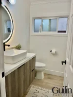 Powder Room with Our Custom Cabinets in From Irvine CA 1 logo