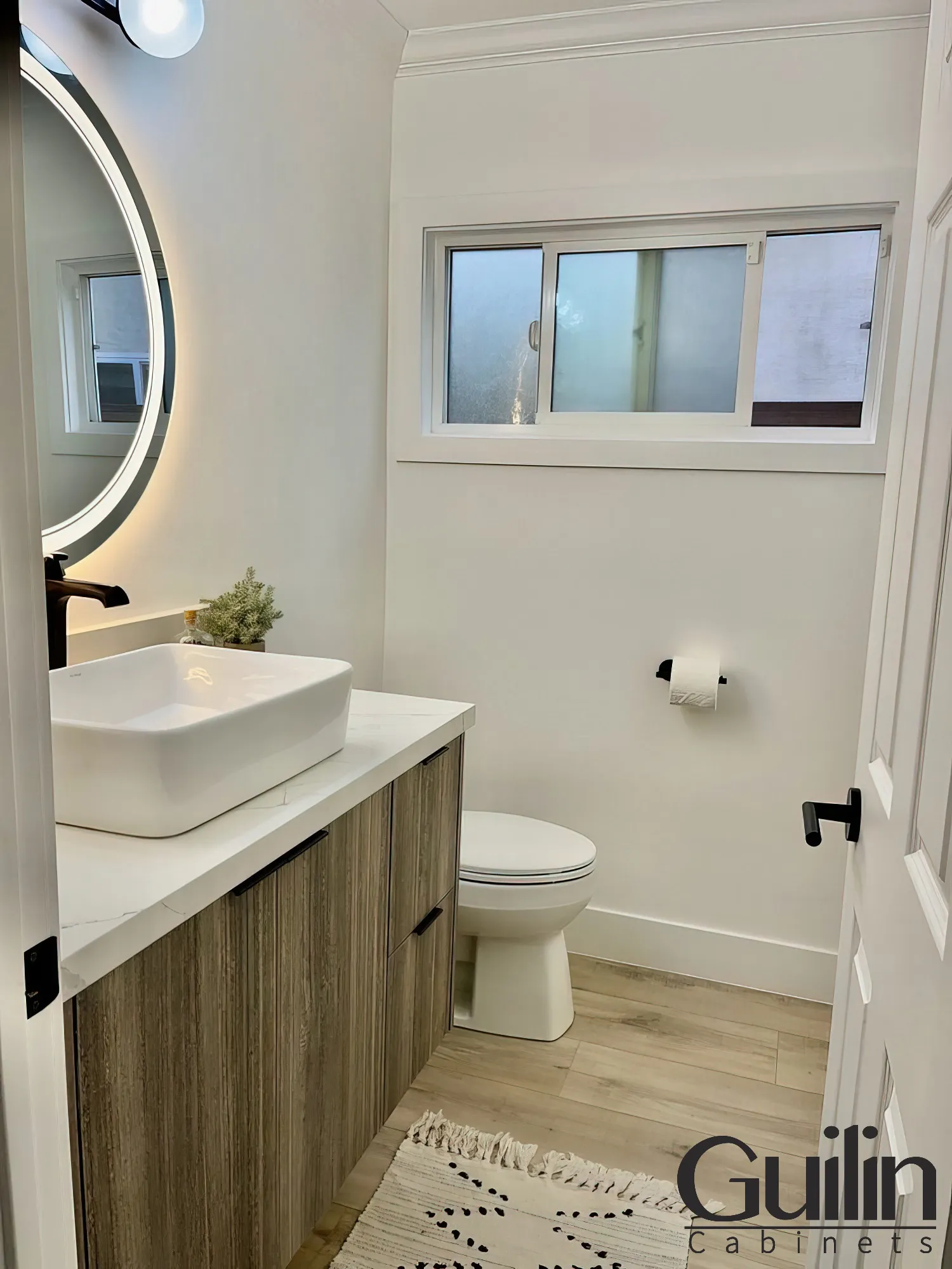 Powder Room with Our Custom Cabinets in From Irvine CA 1 logo