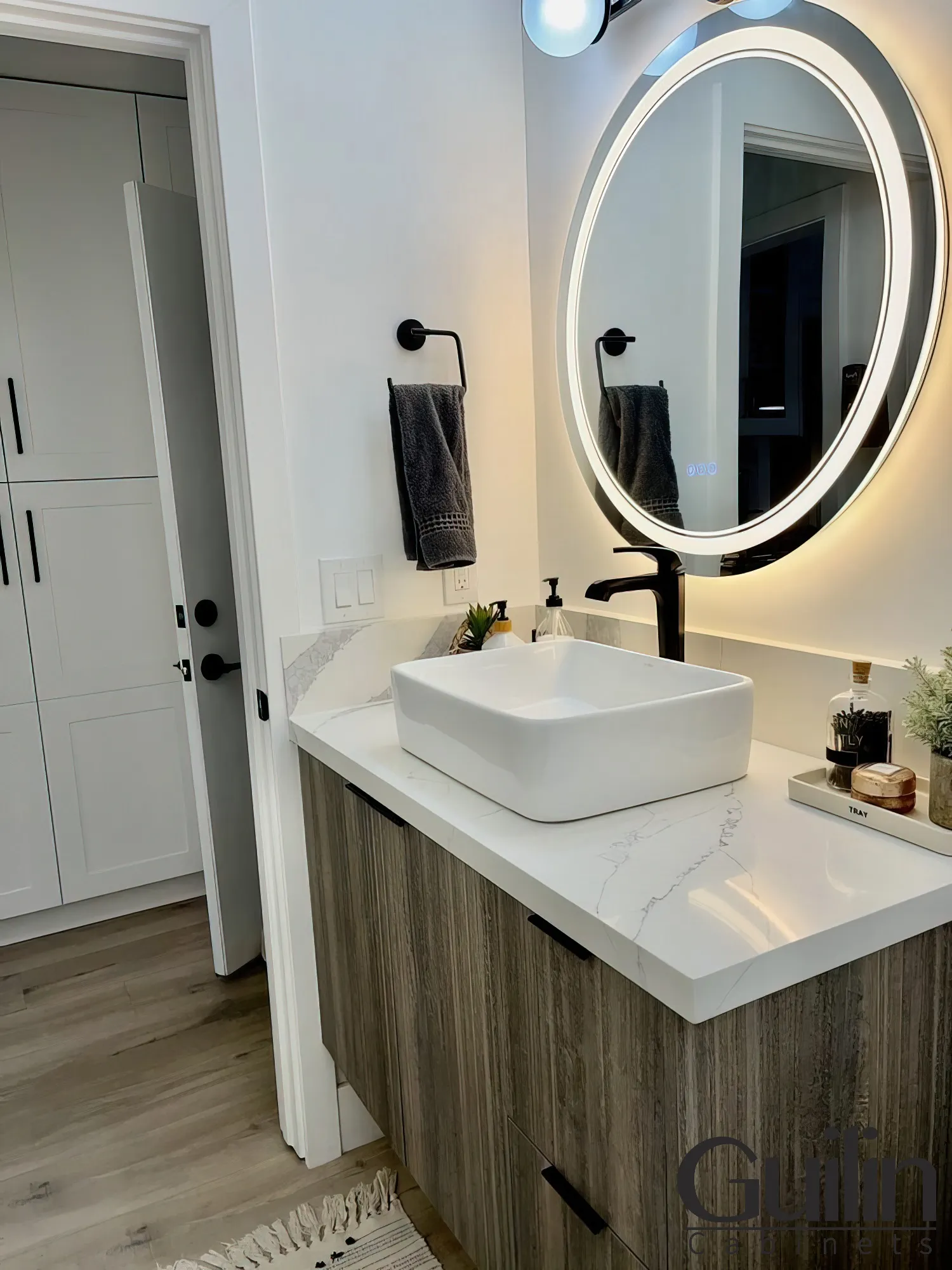Powder room with smart mirror remodeled by Guilin cabinets
