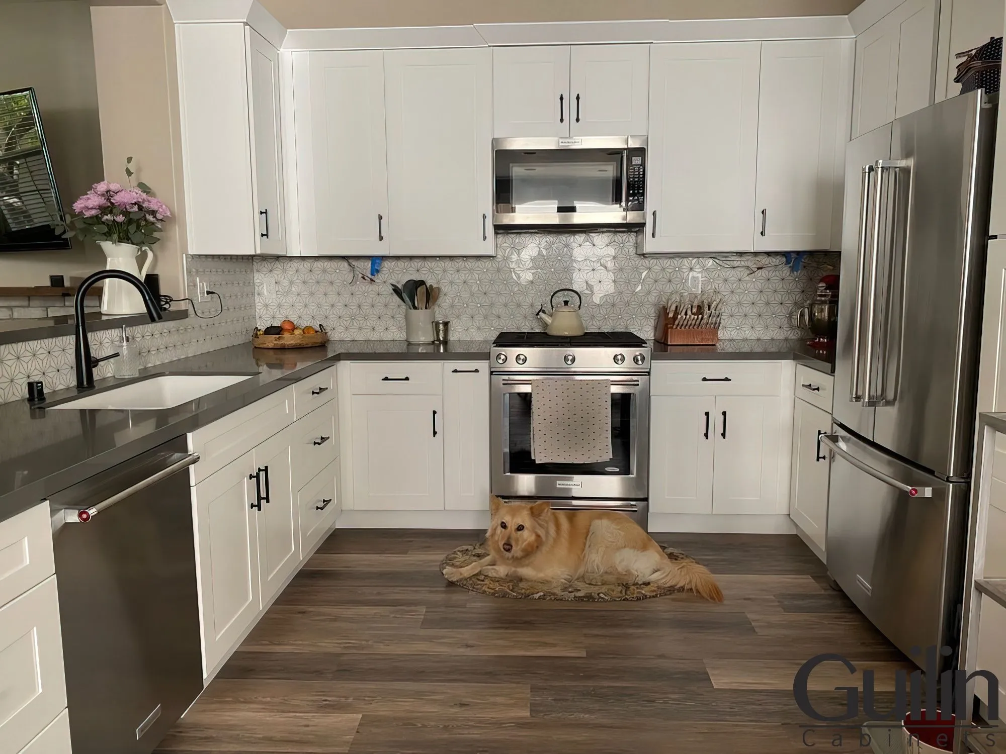 A U-shaped kitchen layout is a popular layout choice among homeowners and designers. It’s a great way to make efficient use of space, allowing for a more organized and efficient kitchen - Remodel Transition Kitchen with Gorgeous Backsplash in Irvine, CA By Guilin Cabinets