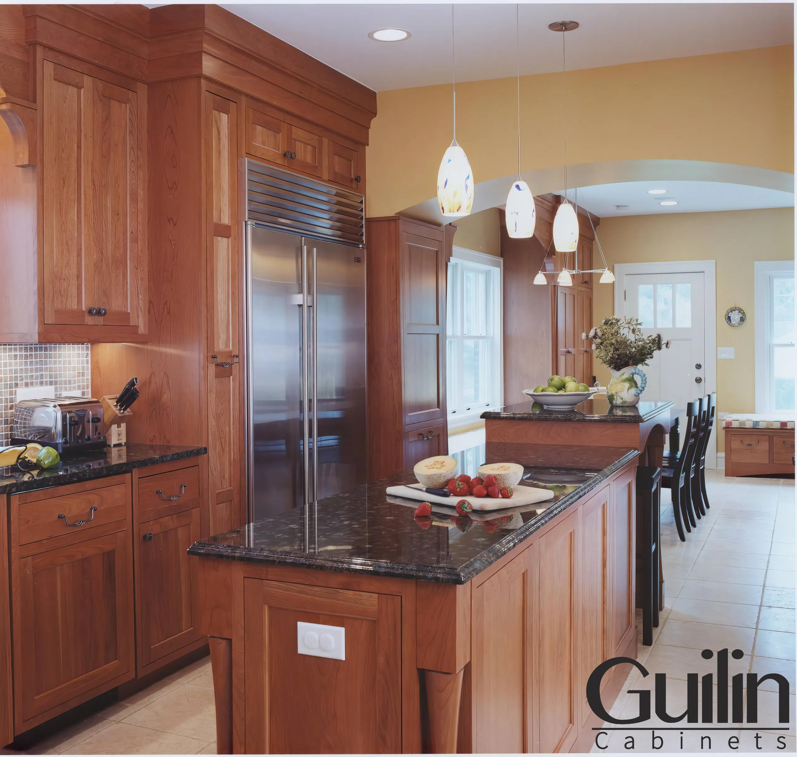 An island adds extra kitchen counter space to an L-shaped kitchen