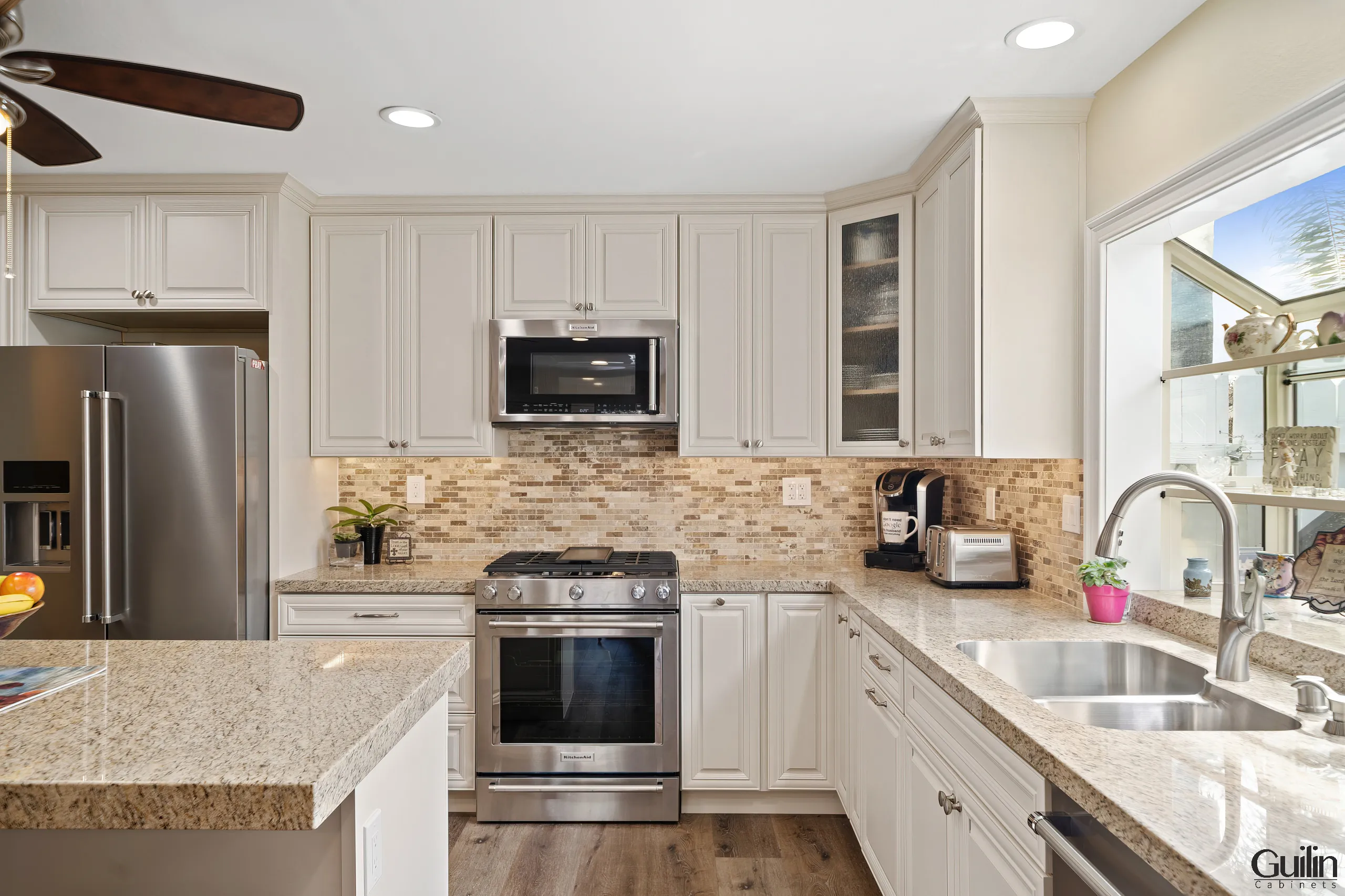 Wall cabinets are mounted on the wall above the countertops, offering additional storage space for items that are not frequently used. 