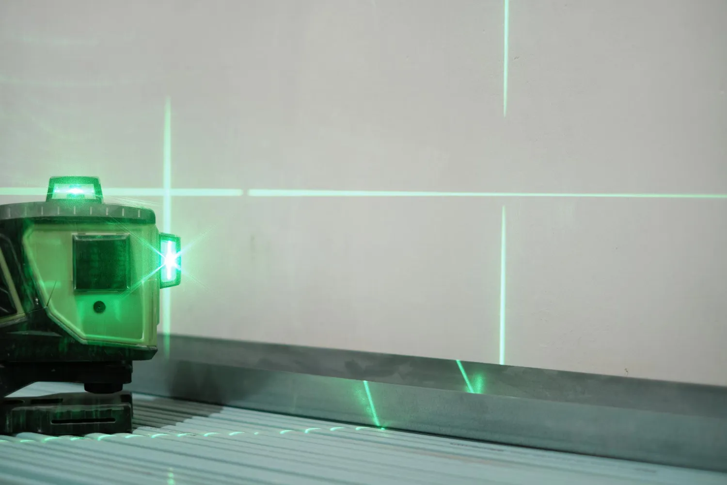 A laser level is an excellent tool for measuring the verticality and horizontality of your kitchen.
