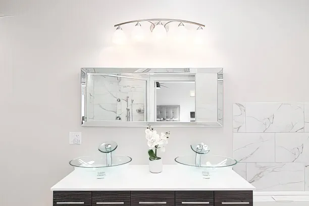 Improving your vanity with new mirrors is another low-cost option.