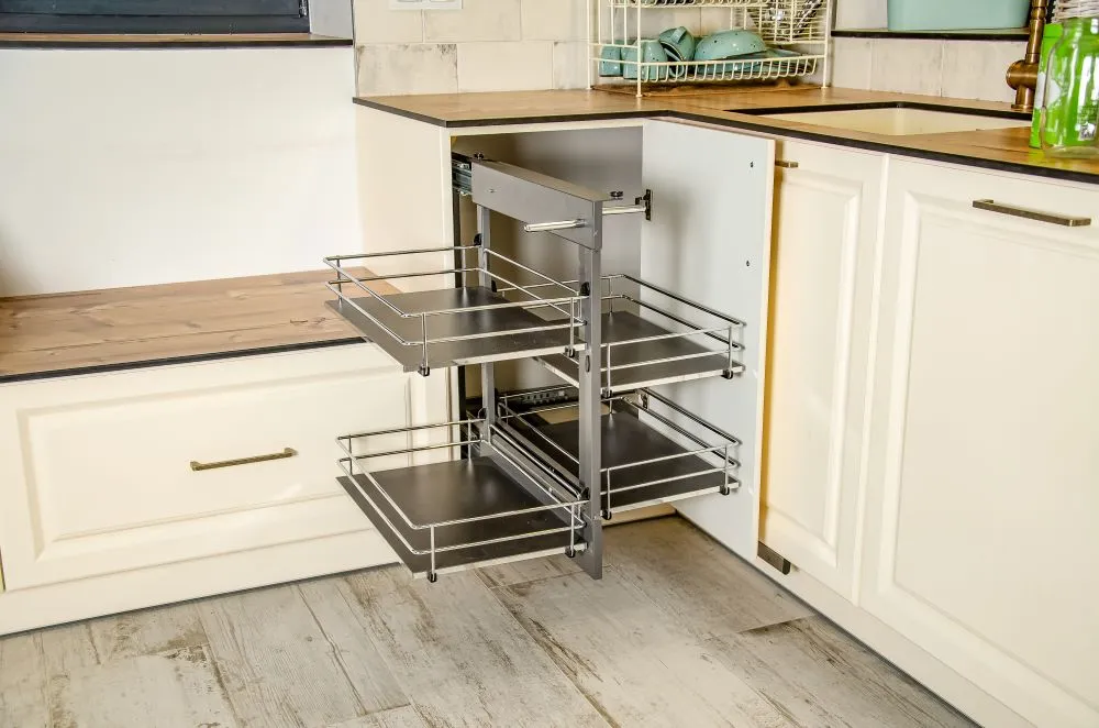 Pull-out shelves (known as pullout solutions) could be the solution to your corner kitchen cabinet problems!