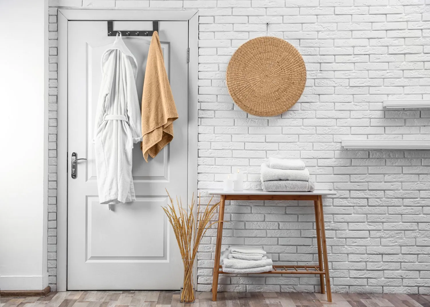 One trick you can try is to hide those bulky towels behind the door that will help you