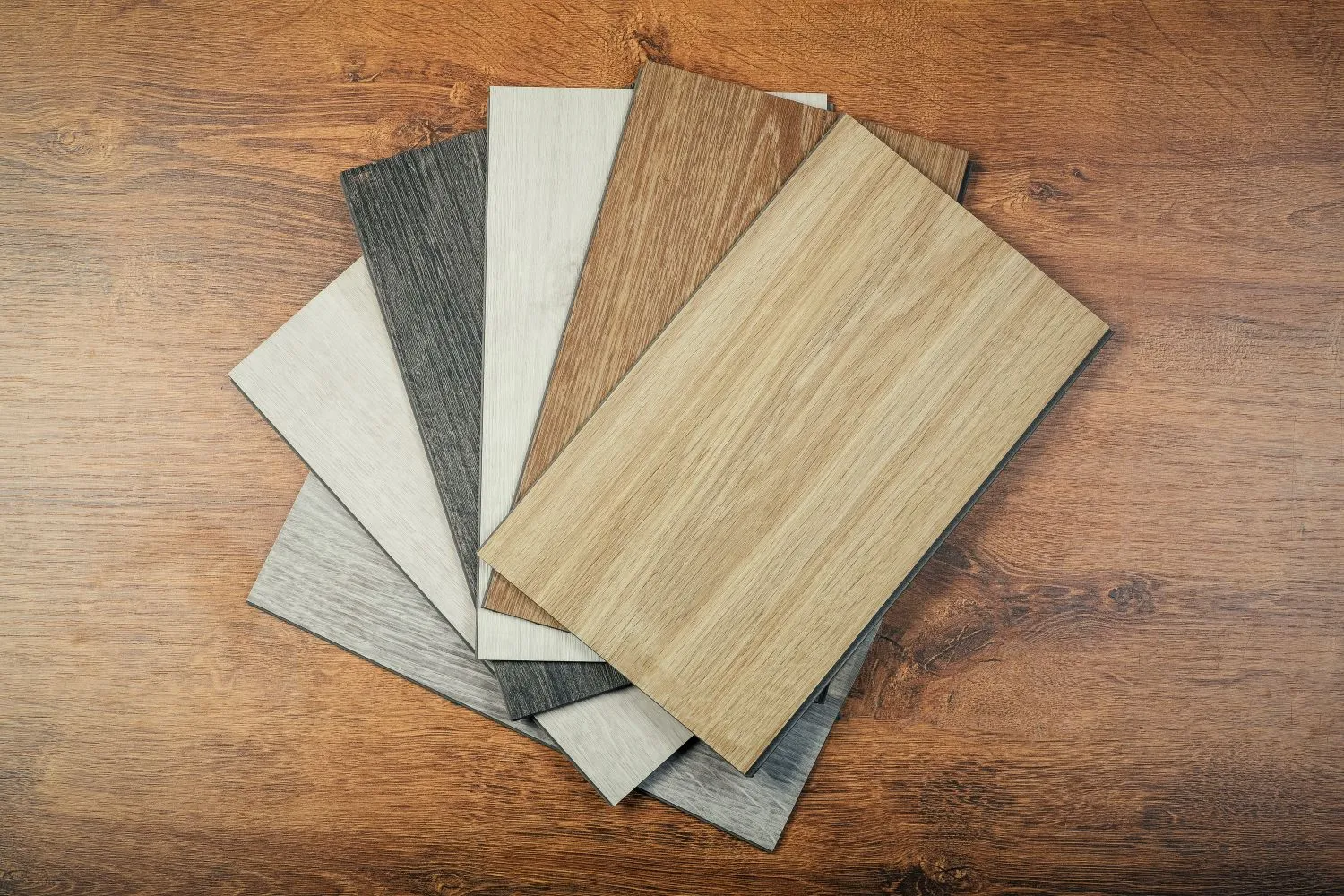 Your budget, personal style, and level of comfort should guide your selection among many flooring options, such as hardwood, laminate, carpet, and vinyl.