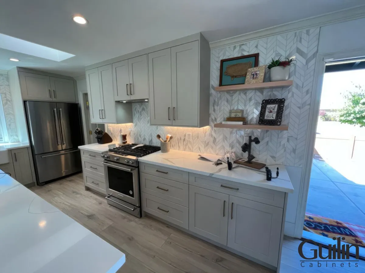 https://guilincabinets.com/wp-content/uploads/2023/08/Open-Plan-Living-Room-Kitchen-Remodel-in-Huntington-Beach-After-3.webp