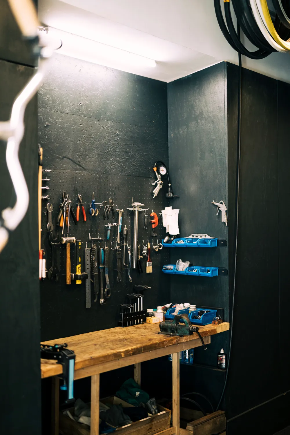 Tools, gardening supplies, and other random objects usually found in the utility room or garage can be stored in garage and utility cabinets.