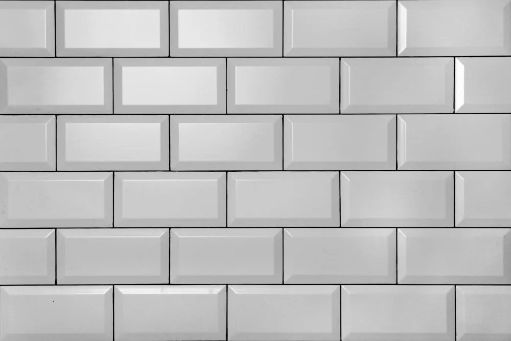 white vintage subway tile backsplash