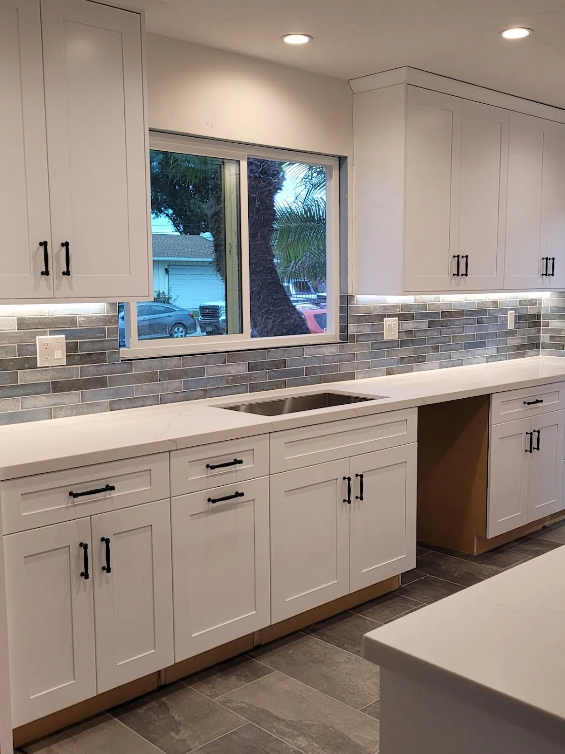Once more, white kitchen cabinets show to be a flexible option that complements a variety of decor styles.