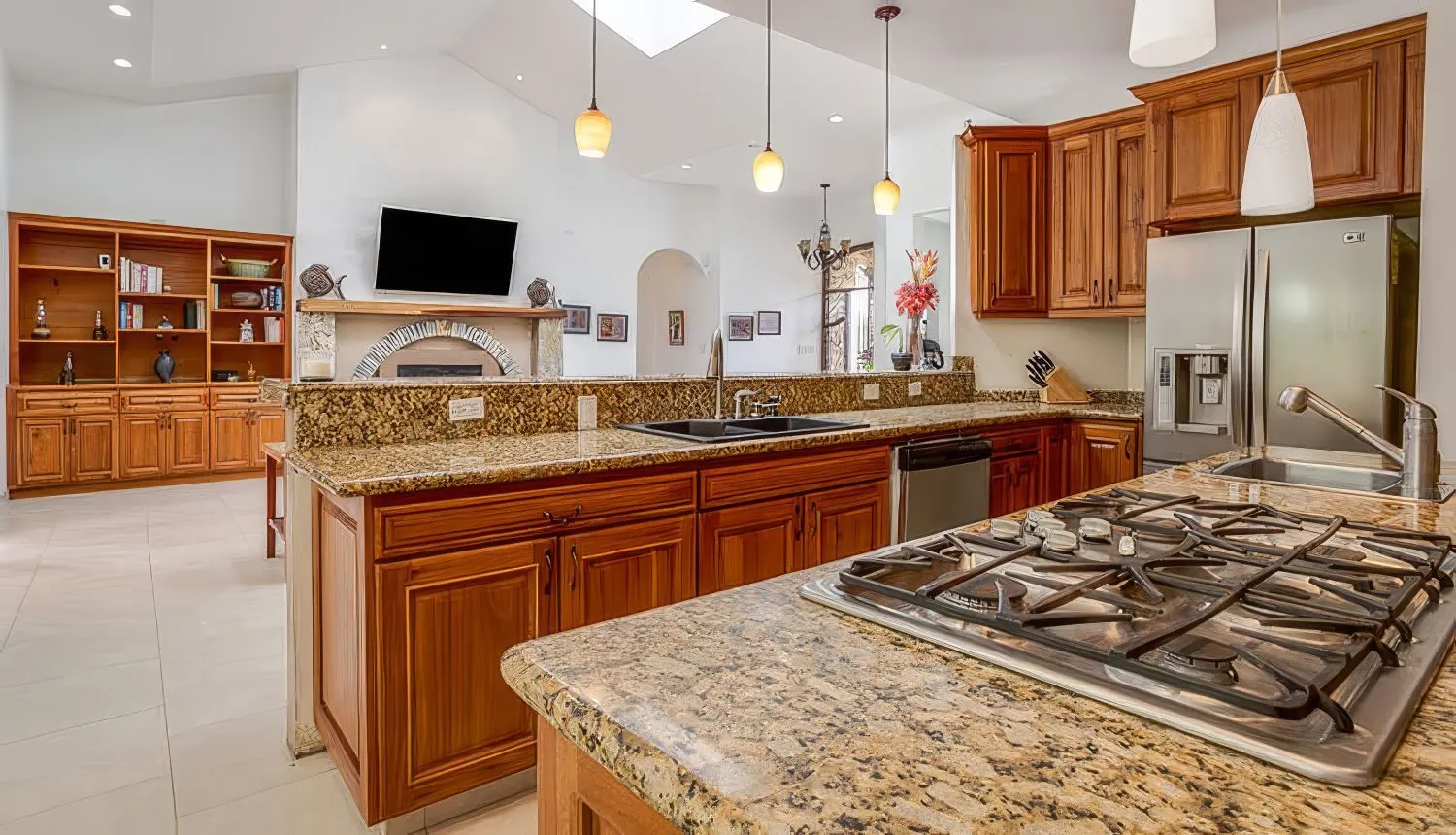 Granite is a popular material for high-end kitchens because of the sophisticated look it can achieve and the depth and character it adds to any space.
